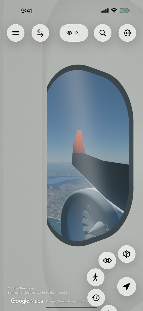 The view from a passenger window, with the wing and engine over New York